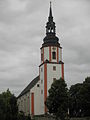 Kirche mit Ausstattung, Kirchhof und Einfriedung