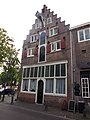 Pakhuis De Klok, Lieve Vrouwestraat 22 (rijksmonument)