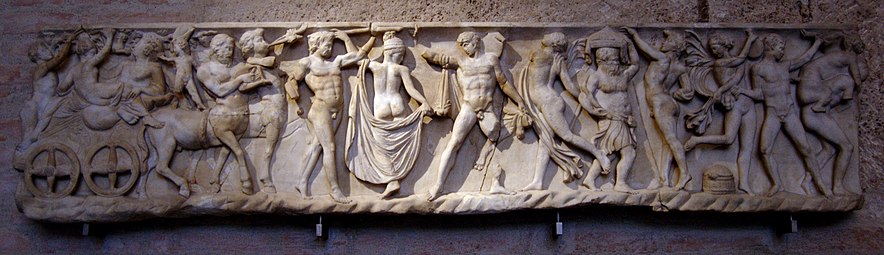 Front side of a Roman sarcophagus, depicting the wedding of Dionysos and Ariadne, with old Silenus figuring in their entourage (sixth figure from the right), 150–160 CE (Glyptothek, Munich)