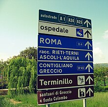 An example of a directional road sign in Italy, in this case near Rieti. Transport Typeface in Italy.jpg