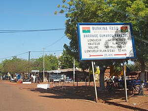 Sign indicating the Oumarou Kanazoé Dam in Yako.