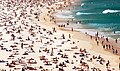 The beach, with numerous sunbathers