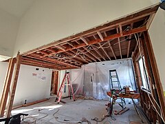 Reconstruction and extension of the suspended ceiling (left); construction of a soffit (foreground); new electrical connections; modification of the water connections