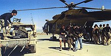 U.S. special forces help Northern Alliance troops from a CIA-operated MI-17 at Bagram Airbase during Operation Anaconda, 2002. Cia-mi17.jpg