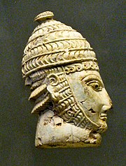 Warrior wearing a boar's tusk helmet, from a Mycenaean chamber tomb in the Acropolis of Athens, 14th-13th century BC. Elephant or Hippopotamus Tooth Warrior Head Wearing Boar Tusk Helmets (3404330867).jpg