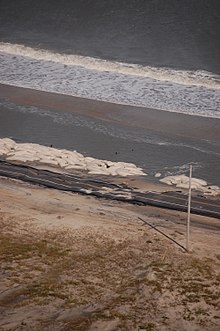 Sandbagged beach at the site of Hurricane Sandy. Hurricane Sandy - sandbagged beach, Cape Hatteras.jpg