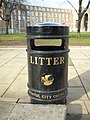 Bin outside Bristol Council bearing the city's emblem.