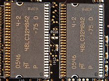 The 64 MB of sound memory on the Sound Blaster X-Fi Fatality Pro sound card is built from two Micron 48LC32M8A2 SDRAM chips. They run at 133 MHz (7.5 ns clock period) and have 8-bit wide data buses. Micron 48LC32M8A2-AB.jpg