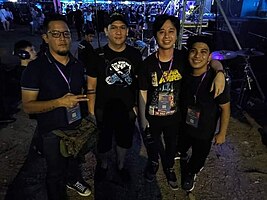Rivermaya in 2019 (from left to right : Nathan Azarcon, Mark Escueta, Mike Elgar, and touring member Aiman Borres)
