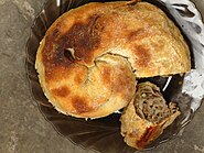 Sarburma is a Crimean traditional meat pie dish originating among ethnic Crimeans. It is a widespread snack in Crimea. Its main ingredients are lamb and dough.