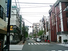A crossroad in a Japanese city.