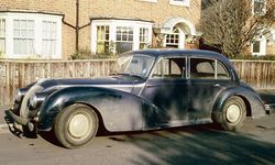 A.C. 2-Litre 1947-1956. The four-door configuration and the wider 6.75 x 16 inch wheels identify this as a later example. The flashing indicators will have been retro-fitted.