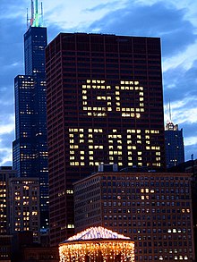 The CNA Center in Chicago flashes a "GO BEARS" window display before a Bears Sunday Night Football game. Cna gobears.jpg