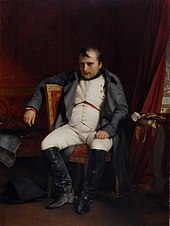 Napoléon de trois-quart assis sur un fauteuil, le bras accoudé au dossier