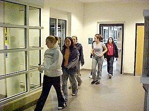 College students evacuate Potomac Hall, a dorm...