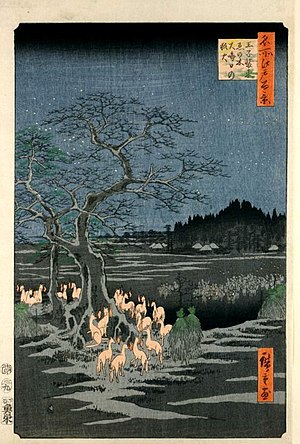 Kitsune glowing with fox-fire gather near Edo....