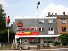 A typical German savings bank branch in Kurten showing the Sparkasse logo Kurten 04 ies.jpg