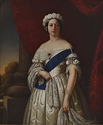 大綬をかけ、ガーターを左腕に着用したヴィクトリア女王の肖像画。