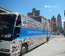 Advertisement for Outlook.com on the side of a bus Outlook hundreds bus W49 & 11 Av jeh.jpg