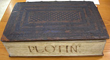 Oxford University's 1492 edition of Plotinus' Enneads, translated into Latin by Ficino, with its original stamped, checkerboard binding in calf over wooden boards. Holes for chain staples and the manuscript title on the text block show chained volumes were shelved with spines to the rear. This copy is thought to have belonged to the royal library of King Philip II of Spain. Plotinus (trans. Ficino), Oxford's 1492 edition with binding.jpg