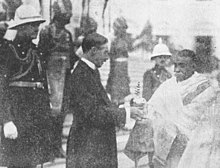 Lawrence Dundas, Lord Ronaldshay and Governor of Bengal (1917-22) presents the Buddha relic which had been discovered 1892 in Battiporolu to Ashutosh Mukherjee, then Vice Chancellor of Calucatta University, acting Chief Justice of the Calcutta High Court and President of the Mahabodhi Society, Calcutta to be enshrined in the newly opened Dharmarajika Chetiya Vihara on College Square. Morning of 26th Nov. 1920 on the steps of Government House, Calcutta. Ronaldshay presentsBuddhaRelic AsutoshMukharji 19201126.jpg