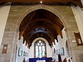 Arch-braced trusses in chancel