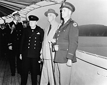 Franklin D. Roosevelt and Winston Churchill during the meeting that would result in the Atlantic Charter, precursor to the Bretton Woods system Winston Churchill with Franklin D. Roosevelt on board USS Augusta (CA-31) on 9 August 1941 (NH 67201).jpg