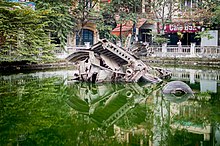 The wreckage of a US Air force B-52 Stratofortress, shot down over Hanoi in 1972. Wreckage of B52 bomber, downtown Hanoi, Vietnam.jpg