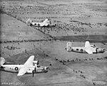 Three 7 OTU Liberators flying in formation