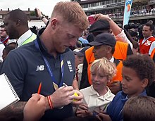 Ben Stokes signing an autograph for a fan, after the World cup victory Ben Stokes.jpg
