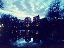 Manhattan Valley: buildings on Central Park West from 100th-102nd Streets, seen from Central Park Central Park, looking west across the Pool.jpg