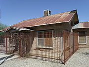 Morcomb's Family House, built in 1936 and located at in the corner of Grand and Myrtle Aves. It is listed as historical by the Glendale Arizona Historical Society.