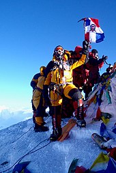 Climber at the summit wearing an oxygen mask Ivan Ernesto Gomez Carrasco en la cima del Monte Everest.jpg