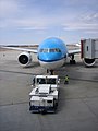 En KLM Boeing 777 under pushback, Narita International Airport.