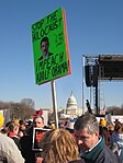 Two days after inauguration, a protester at the March for Life in Washington, DC compares Barack Obama to Adolph Hitler