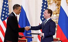 U.S. president Barack Obama and Russian president Dmitry Medvedev after signing the New START treaty Obama and Medvedev sign Prague Treaty 2010.jpeg