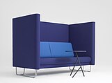 A sofa with high arms/seat back for meetings and or extra privacy in public spaces, designed by Busk-Hertzog in 2011.