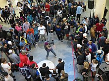 Women breakdancing for a crowd Rarity (8174066414).jpg