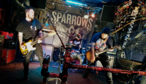 Sparrows performing in Toronto, Ontario in 2018. From left to right: Dan Thomson, Jon Busby, and Justin Sears