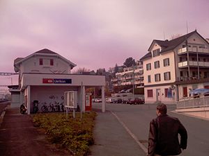 Two-story building next to double-track railway line