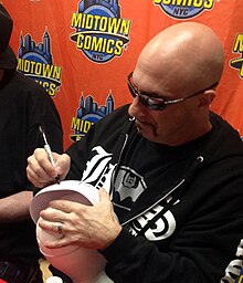 Artist Greg Capullo signing a Court of Owls replica mask during an appearance at Midtown Comics. 9.17.16GregCapulloByLuigiNovi5.jpg