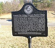 A color photograph of a Georgia historical marker for "Central City College/Georgia Baptist College"