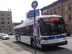 A Q100 entering northbound service in Queens Plaza