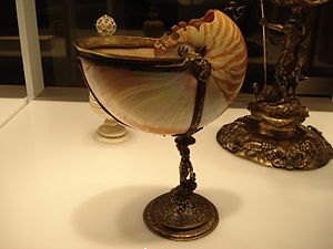 Nautilus shell, mounted on chiselled silver ba...