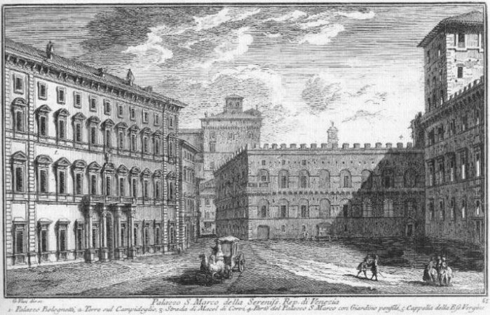 Nesta gravura de Giuseppe Vasi (1745), o Palazzetto Venezia está em sua posição original, bem na frente da imagem (o local hoje é o meio da Piazza Venezia). A entrada para a capela é a portinhola embaixo à direita, perto de onde o Palazzeto se encontrava com o Palazzo Venezia, que ainda está em sua posição original.]]