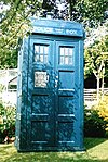 The TARDIS in its typical blue police box disguise