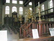 Interior of the Amsterdam Synagogue: the bema (or tebah) is in the foreground, and the Hekhal (Ark) in the background. SPAmster.JPG