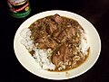 Smothered pork roast rice and gravy