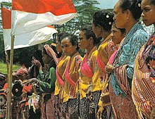 Timorese women with the Indonesian national flag Timor Timur women.jpg