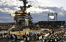 The North Carolina Tar Heels and Michigan State Spartans await the tipoff of the 2011 Carrier Classic on the flight deck of the USS Carl Vinson.